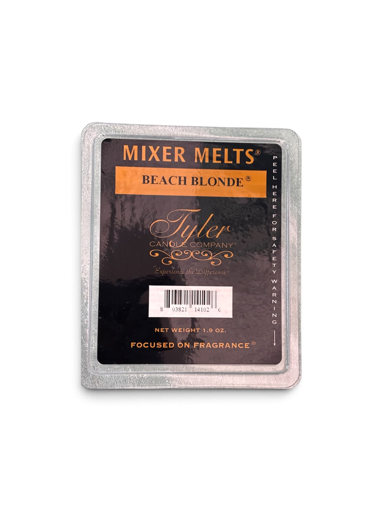 Packaged Tyler Candle Company wax melt in a silver tray