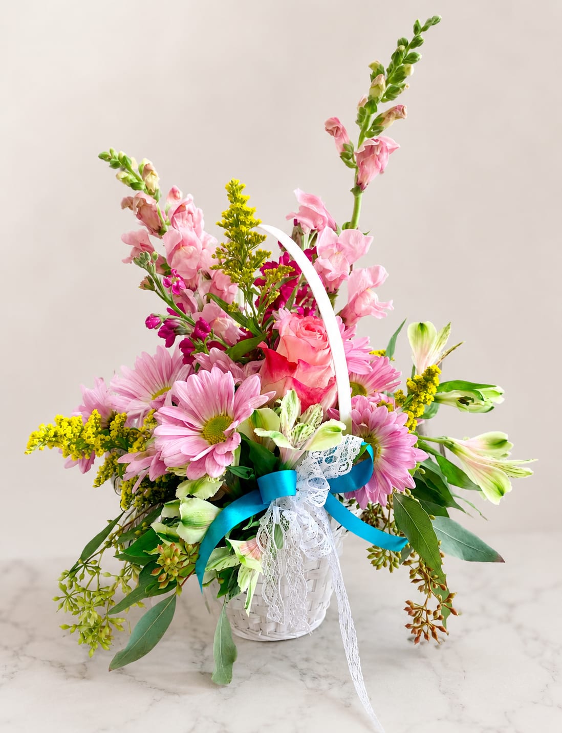 Midsummer Nights - A dreamy mix of pastel flowers arranged in a basket.  Color of basket may vary (Flower colors may vary. All designs are arranged as similar as possible. We promise to keep the same color, style, and overall theme with what Mother Nature generously blesses us with)