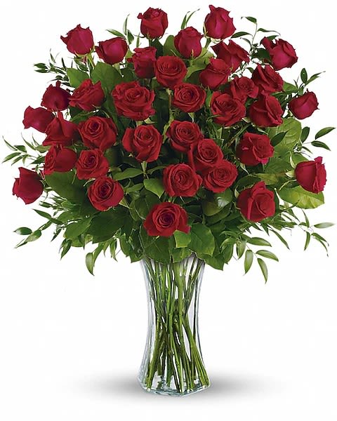 Bouquet of red roses in a clear glass vase