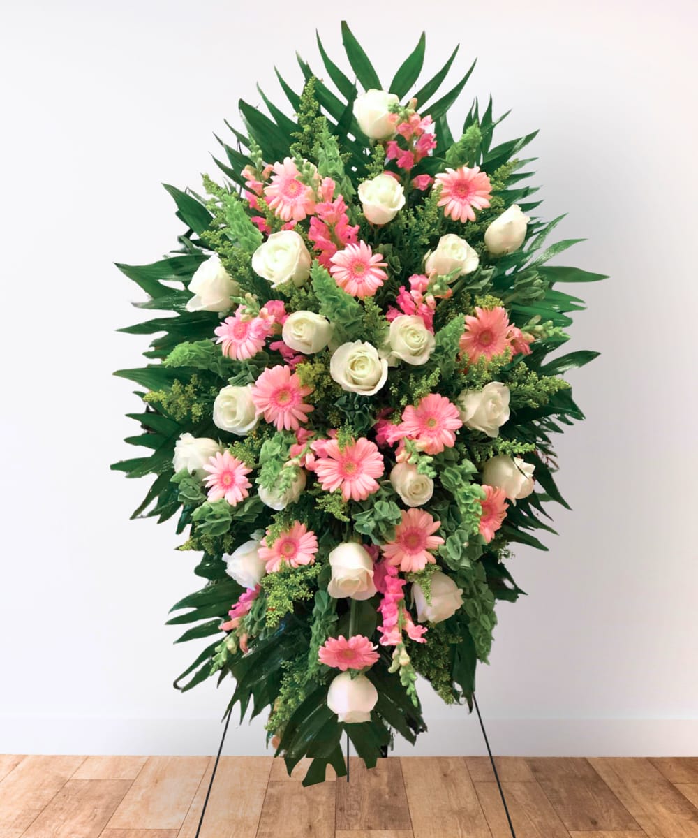 Standing floral spray with pink daisies and white roses
