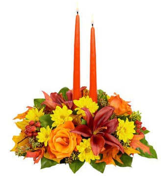 Fall Candle Centerpiece - Round (Seasonal) - A traditional round shaped tabletop candle centerpiece for the holiday season. Made with fresh cut daisies, roses, coffee beans and autumn leaves.