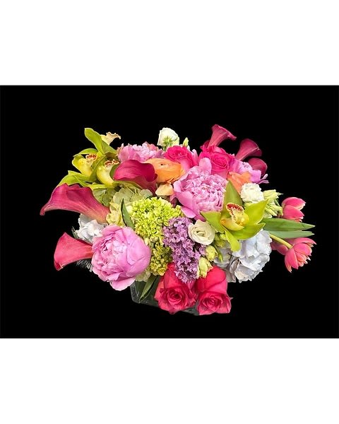 Mixed bouquet of pink, purple, and white flowers