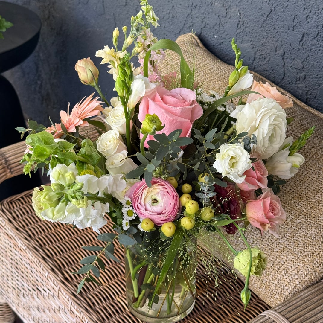 Mixed pink and white bouquet in a glass vase