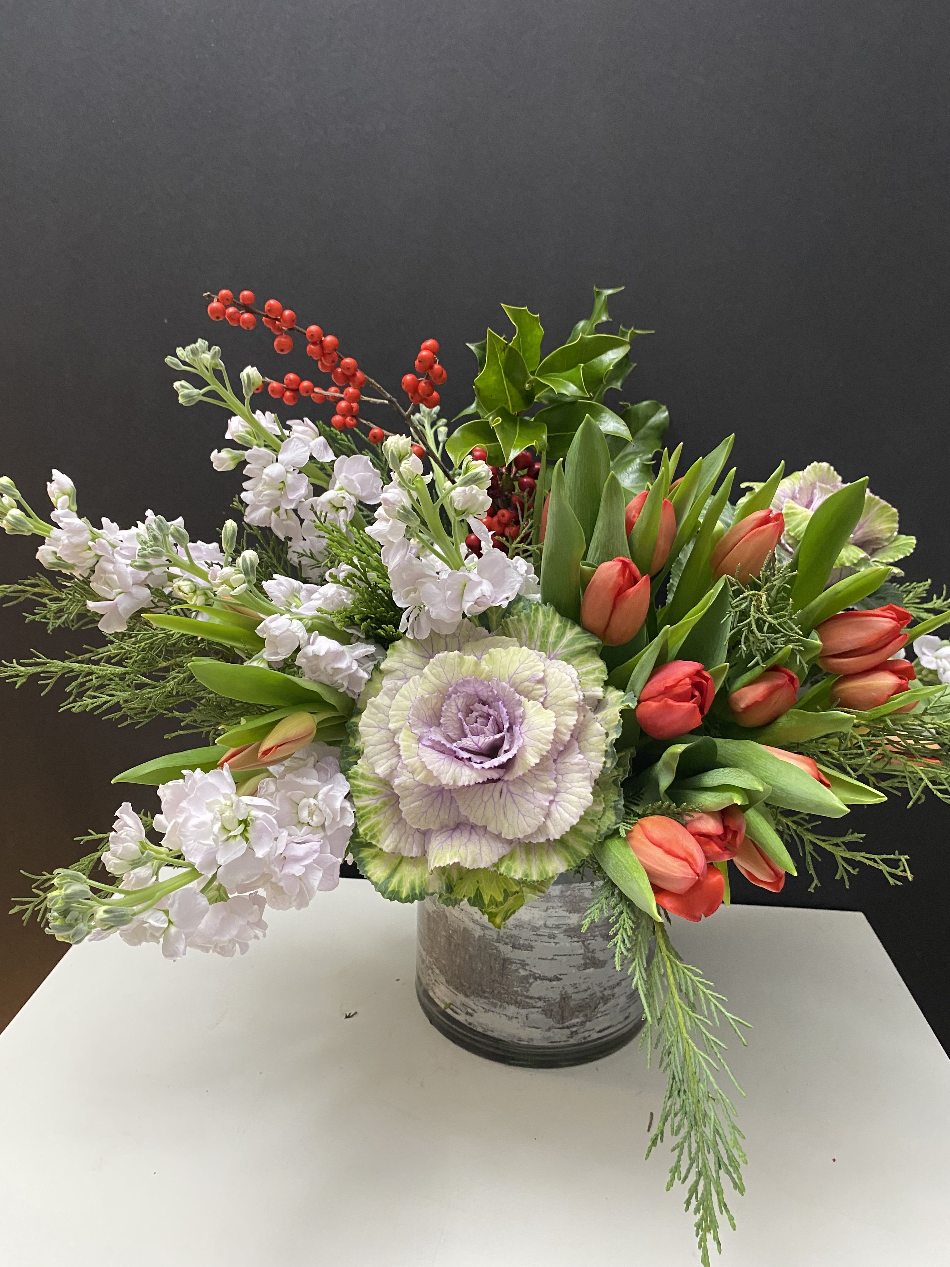 Holiday Direction - Tulips, Stock, berries, Kale in glass vase 