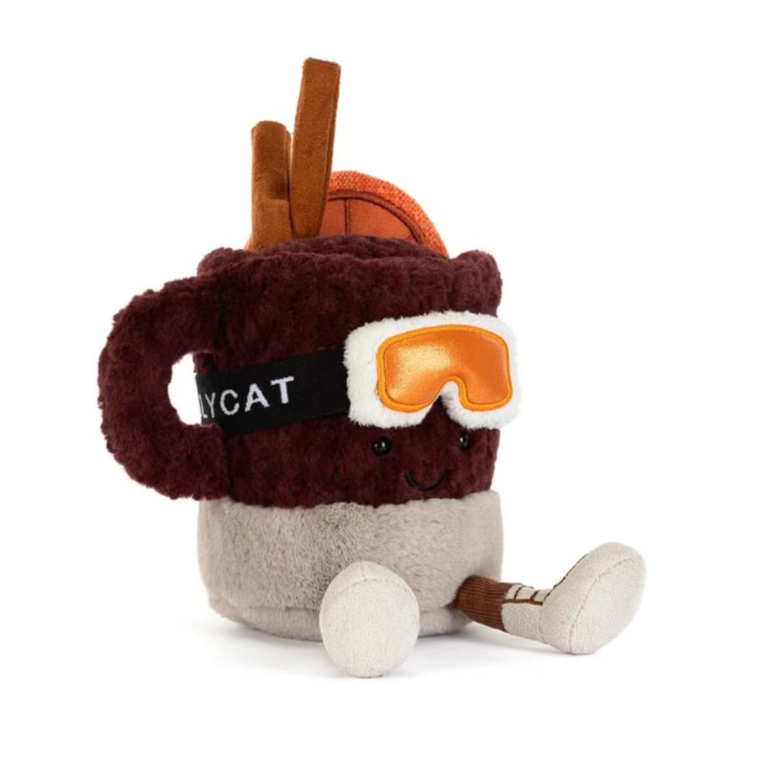 Plush mug-shaped toy with ski goggles and a smiling face