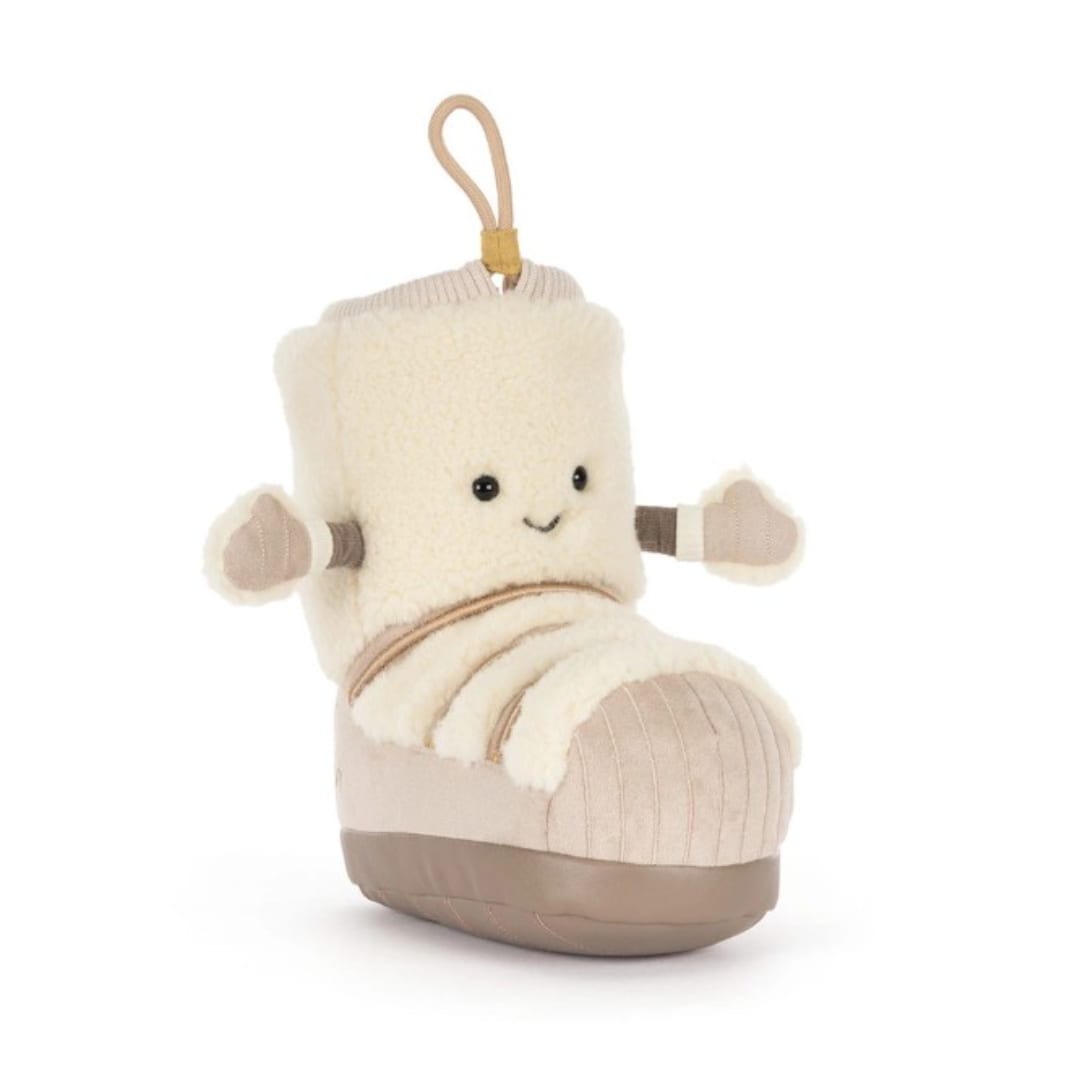 Plush baby bootie ornament with a smiling face and hanging loop