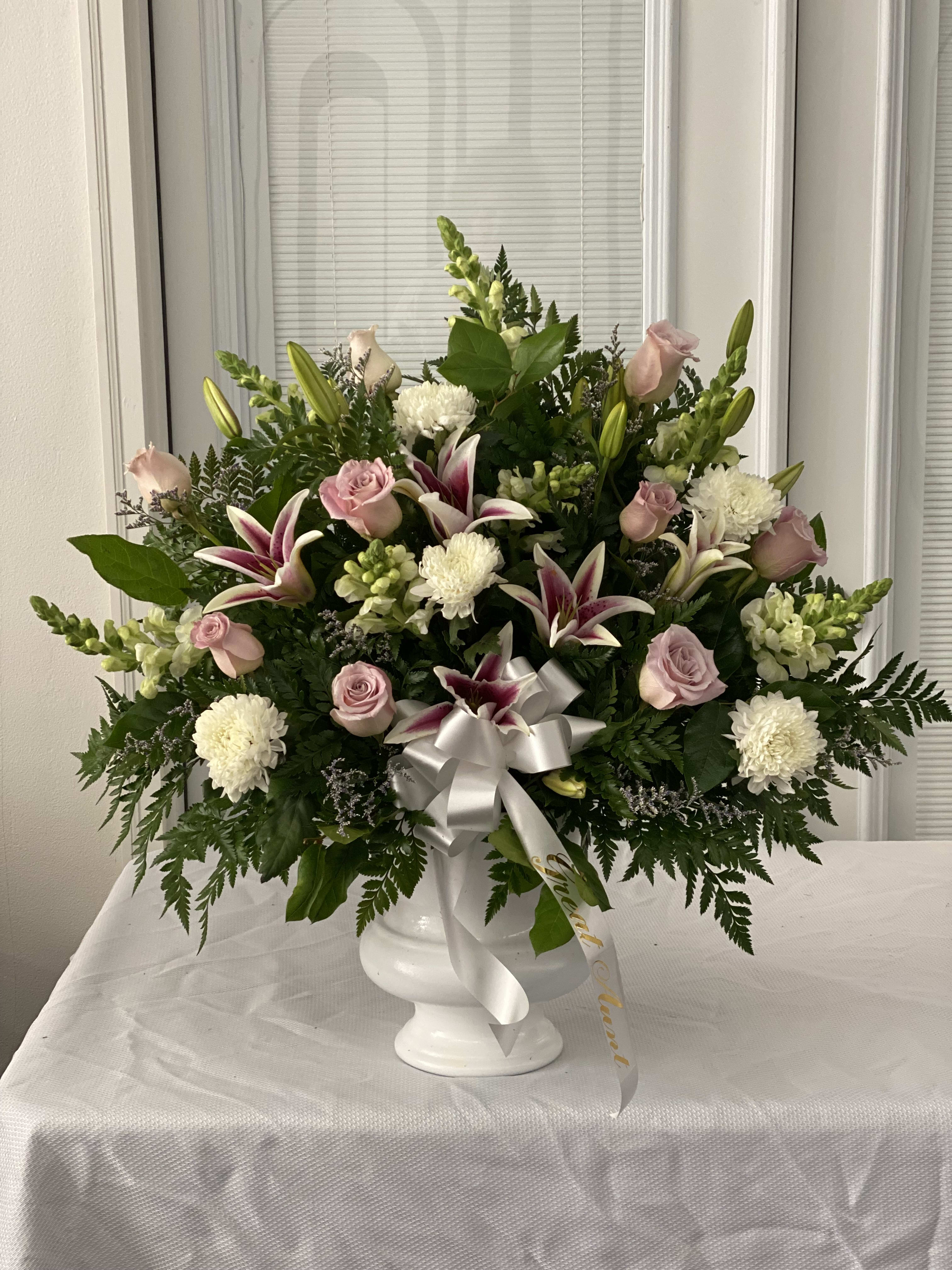 Heartfelt Sympathies Pink &amp; White Standing Basket - It can be difficult to find the perfect way to express all the sympathy, care and concern you feel during times of sorrow. Artistically crafted by our expert florists using fresh, beautiful pink and white flowers, this standing basket arrangement is a heartfelt way to convey all the love and support you have in your heart. 