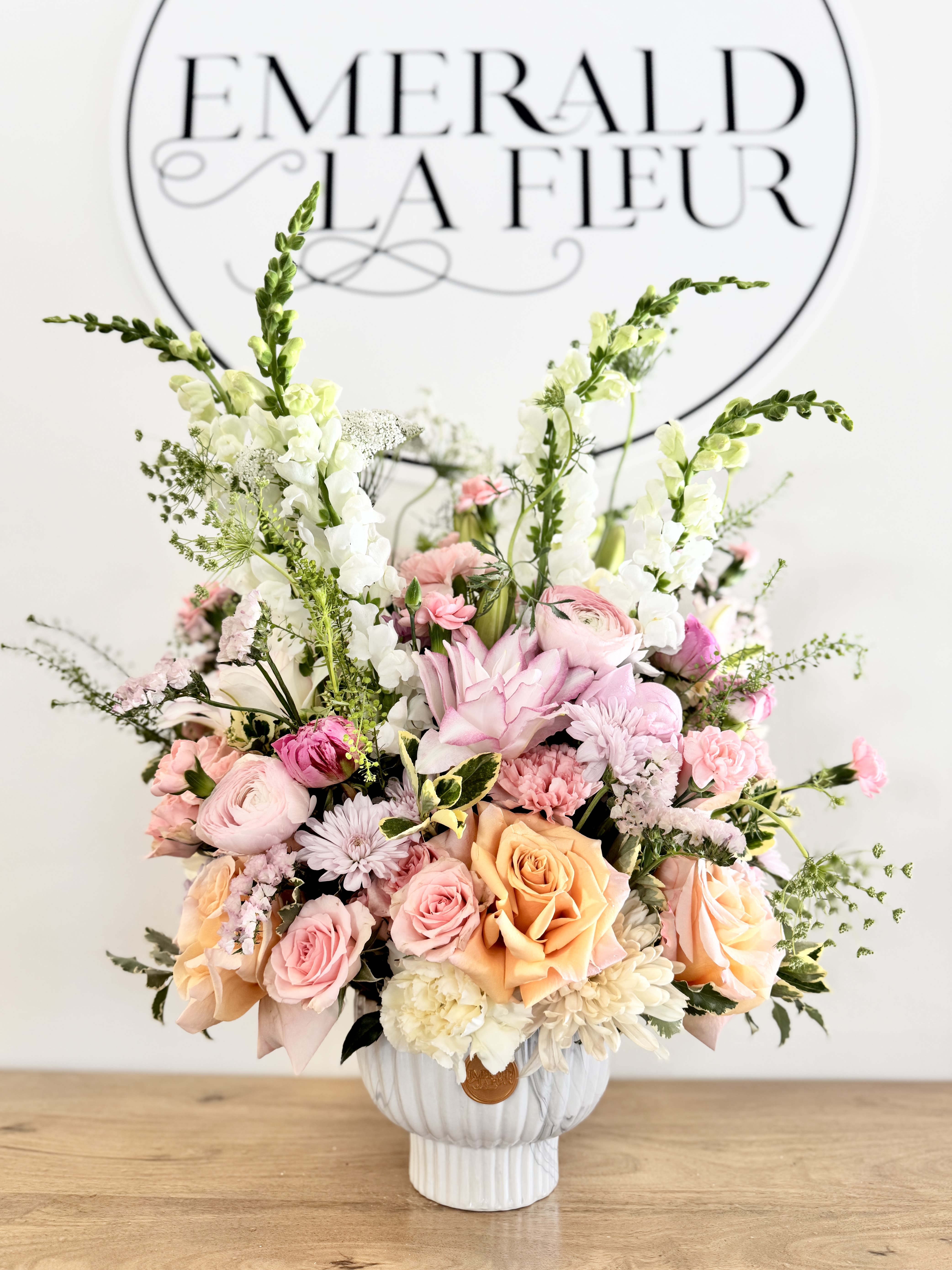 Prestige - An extraordinary floral statement designed for life's most significant celebrations and accomplishments. Prestige showcases an abundant collection of premium seasonal blooms, thoughtfully curated and artistically arranged by the Florist to create a design that is both elegant and unforgettable.  Created with movement, texture, and luxurious floral varieties, each arrangement is one of a kind, allowing the beauty of the season to guide the design. Whether sent to commemorate a grand opening, celebrate a major achievement, honor a milestone, or make a meaningful gesture, Prestige is designed to leave a lasting impression.  Presented in a premium vessel and crafted with exceptional attention to detail, Prestige is a sophisticated expression of celebration, success, and generosity. A truly remarkable gift for moments that deserve nothing less than extraordinary.