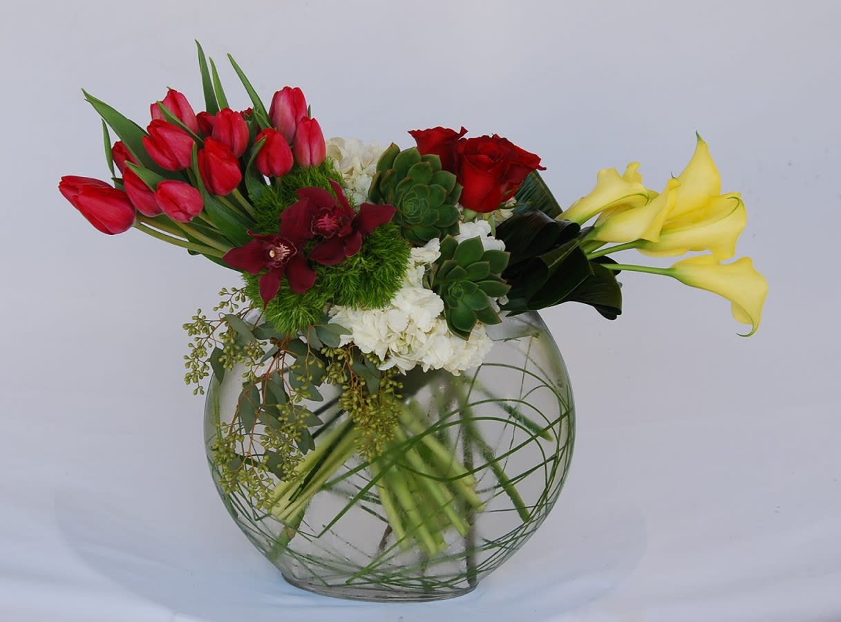 Love Blossom  - Oval Vase With Calla Lilly, Roses, Green Ball, Cymbidium Orchid, Hydrangeas and Succulents.