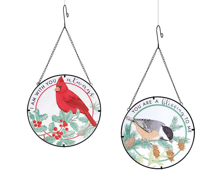Two round hanging bird-themed wall signs with seasonal text