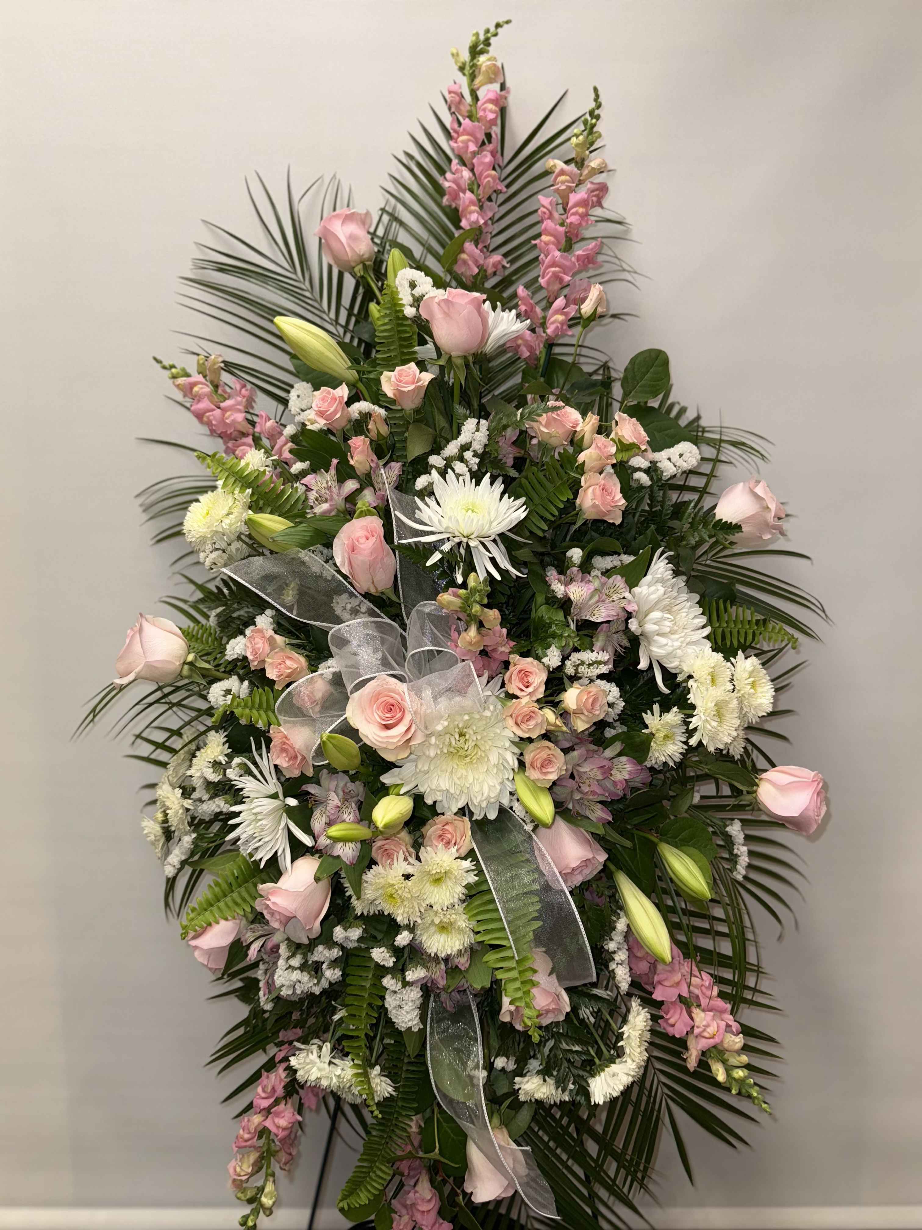 Tall standing floral spray with pink roses and white chrysanthemums
