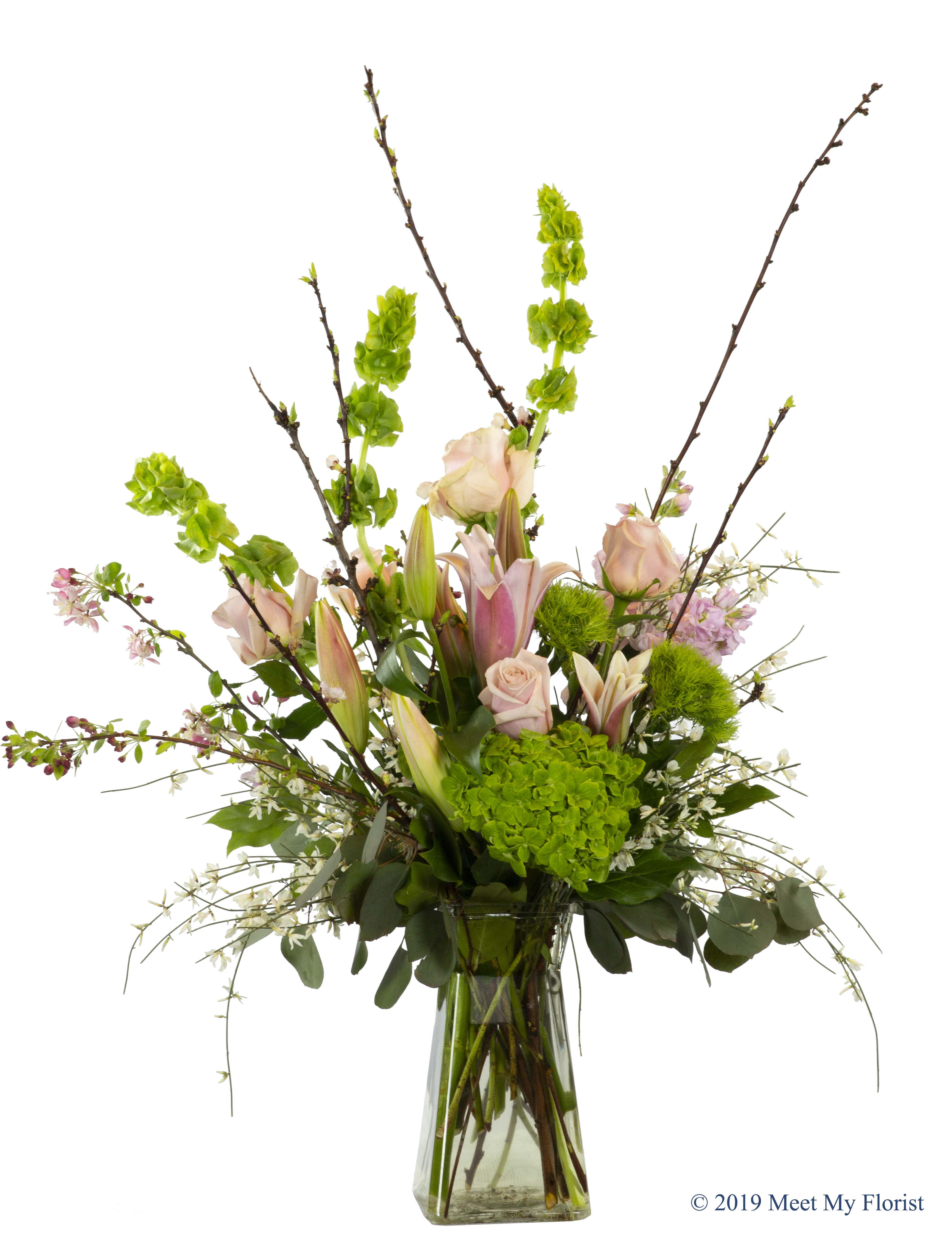 Fume blanc - vase arrangement that looks like it came strait from the garden in pink green and white