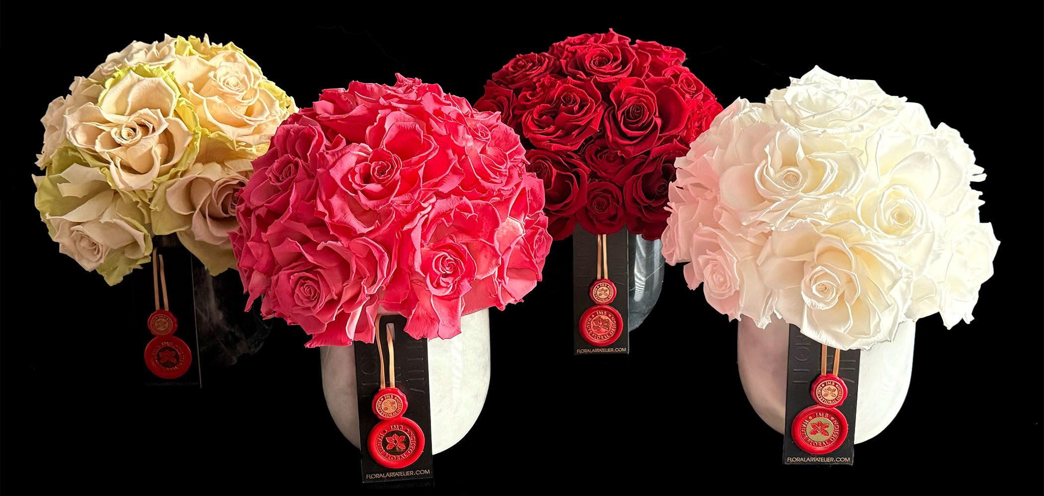Four round rose bouquets in cream, pink, red, and white.
