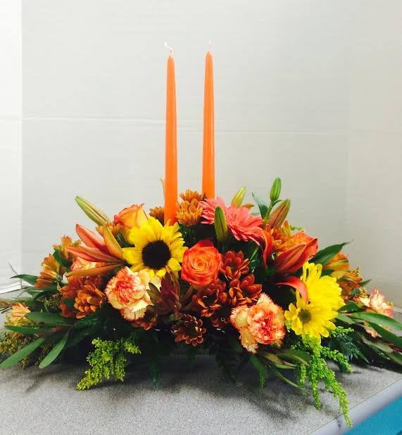 Thanksgiving Day centerpiece - Seasonal flowers may vary based on availability. 