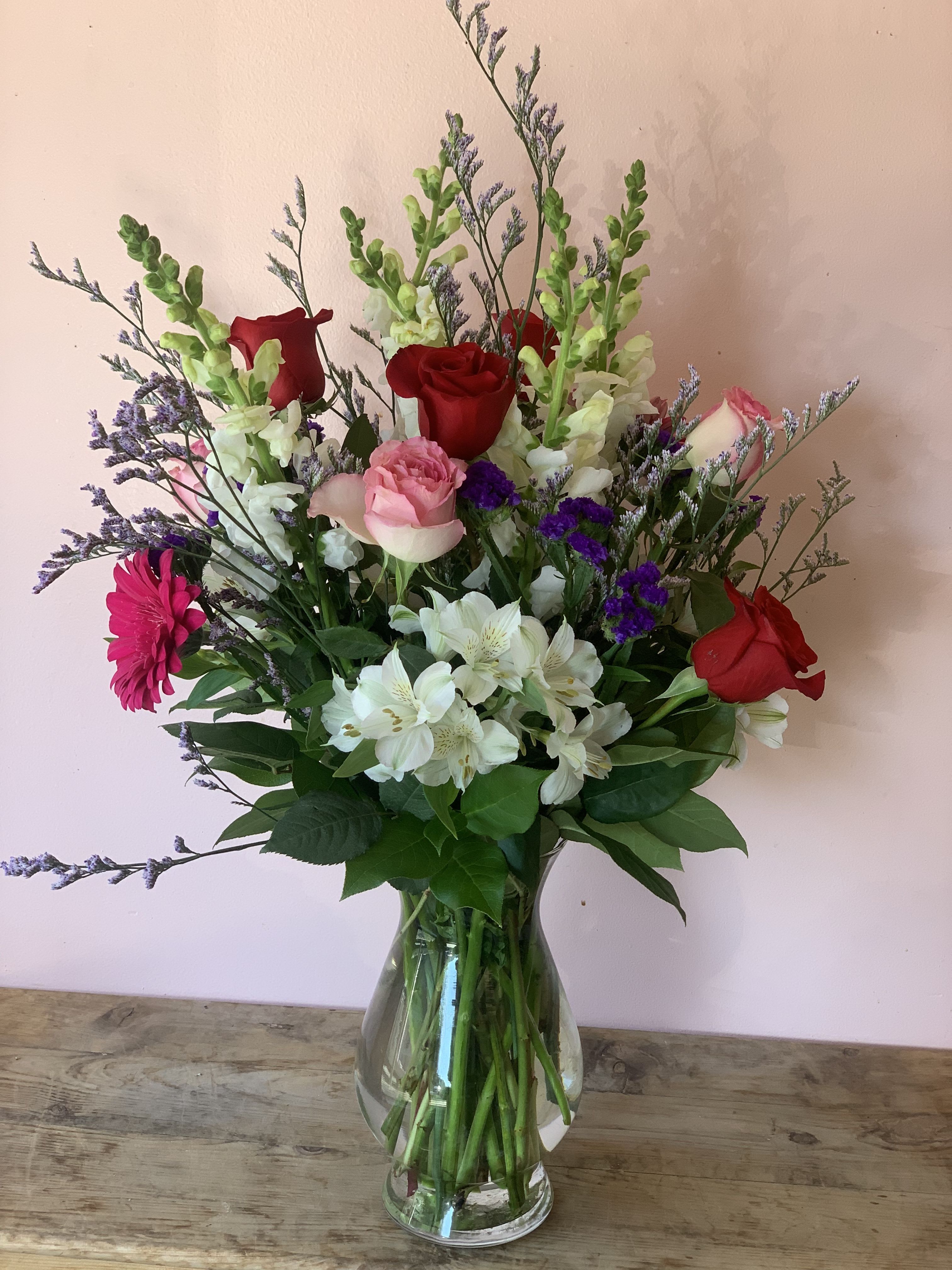 Pet-Safe Snapdragon &amp; Rose Arrangement | Same Day Flower Delivery SF - Give the gift of luxury without the worry. Crafting premium cat friendly flower arrangements shouldn't mean sacrificing style or elegance. Designed by your trusted local florist San Francisco, this vibrant botanical design features a stunning selection of 100% non toxic flowers for cats, allowing pet parents to display fresh, colorful blooms with absolute peace of mind.  We skip dangerous true lilies completely, instead hand-selecting magnificent Roses, towering Snapdragons, colorful Alstroemeria, rich Statice, and delicate Caspia. Together with the textured layers of Statice and Caspia, this architectural arrangement brings high-end luxury straight to any pet-owning home.  Why Pet Parents Love This Arrangement      100% Cat Safe: Every single stem is curated from safe, pet-friendly floral varieties.  Easy Delivery Options  Take advantage of our reliable same day flower delivery SF services. As a dedicated local florist in San Francisco, we handle our own florist delivery San Francisco operations directly, ensuring your safe bouquet arrives pristine, hydrated, and perfectly styled. We serve homes and offices across the city. Rely on us for premium flower delivery in San Francisco from the most trusted florist in San Francisco for stunning, worry-free cat friendly flowers.  Dimensions Approximately: 20"H x 15"W