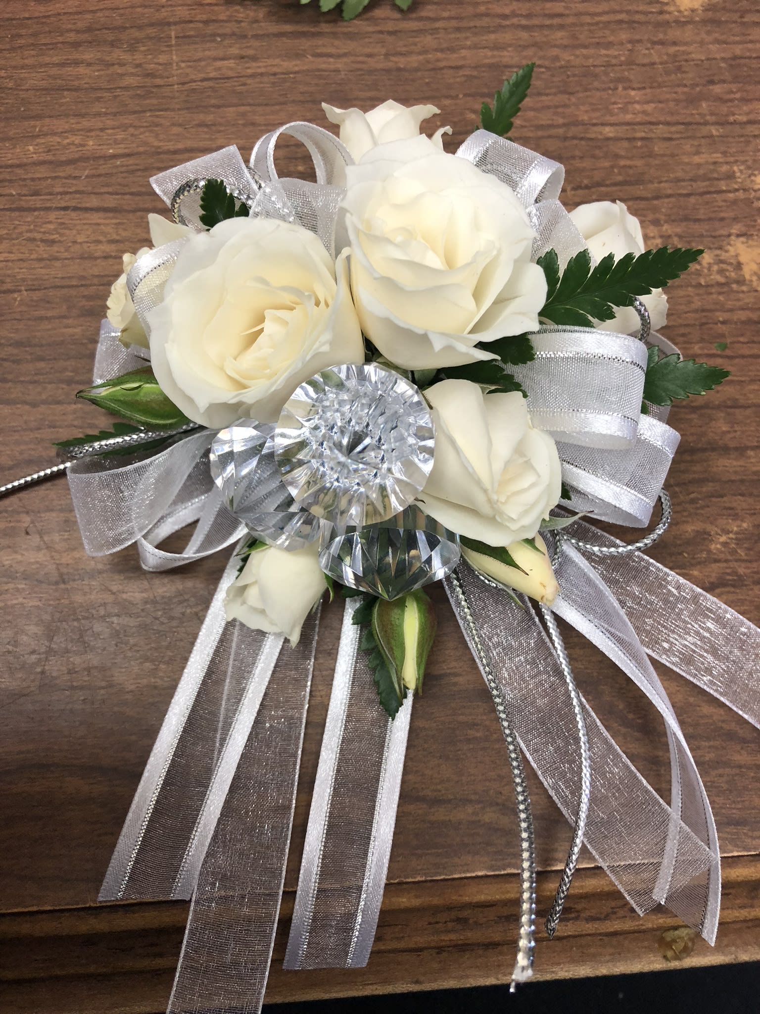 White rose bouquet with silver ribbon and crystal accents
