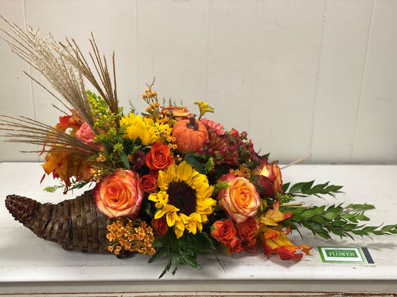 Classic Thanksgiving Cornucopia - Celebrate the season of Thanksgiving with this traditional symbol of autumnal abundance. The perfect Thanksgiving table decoration, this beautiful cornucopia is rendered as a horn-shaped wicker basket filled with fall flowers and harvest wheat. Also, ideal for the kitchen counter, coffee table or entryway.
