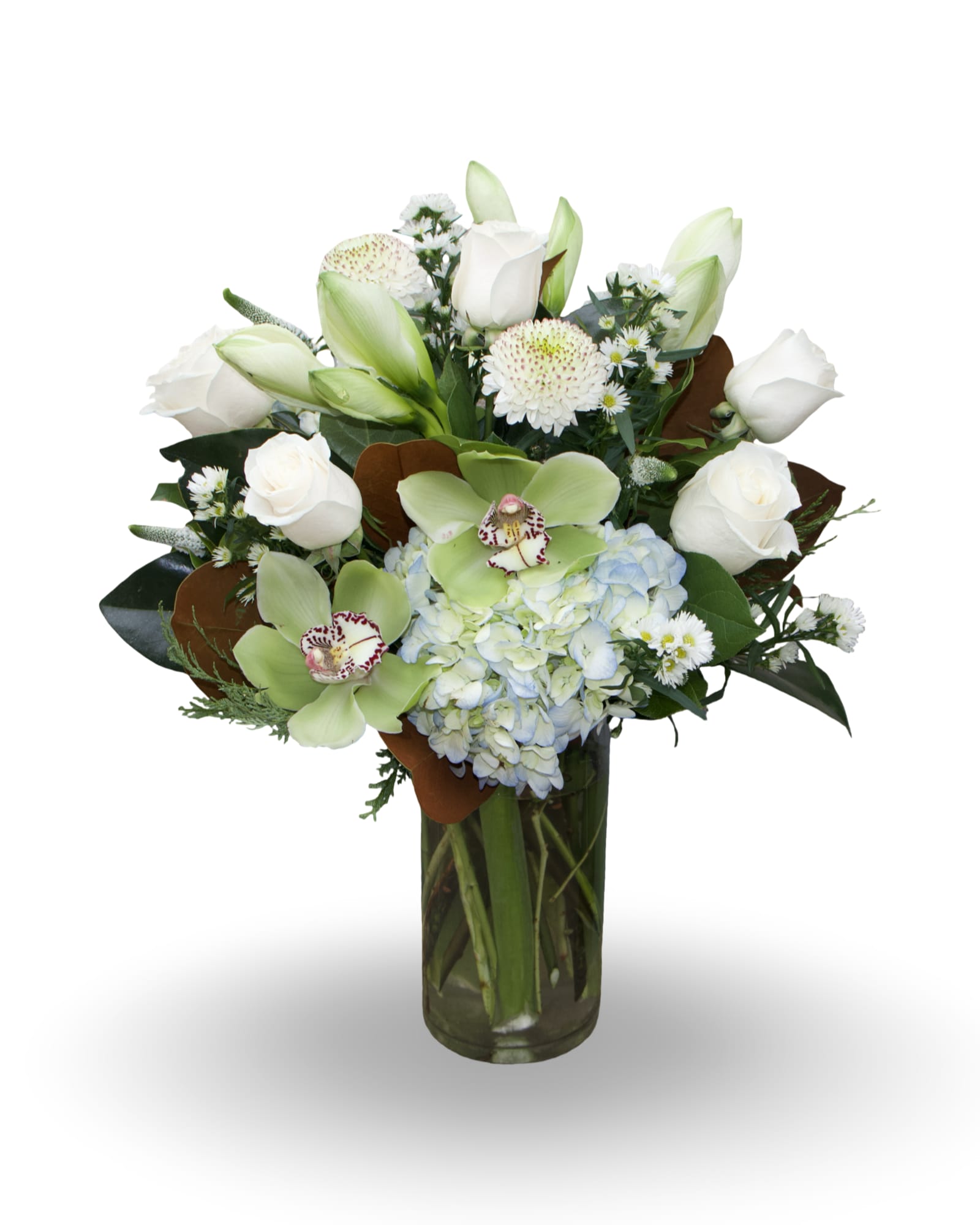 White roses and green orchids arranged with blue hydrangea in a glass vase