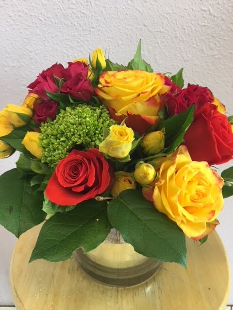 Taste Of Heaven by Forever Flowers - The perfect bouquet for small tables, can be used as centerpiece or someones office,  this bright colorful arrangement comes in a beautiful silver vase and it can be customize to a larger vase if desired.  