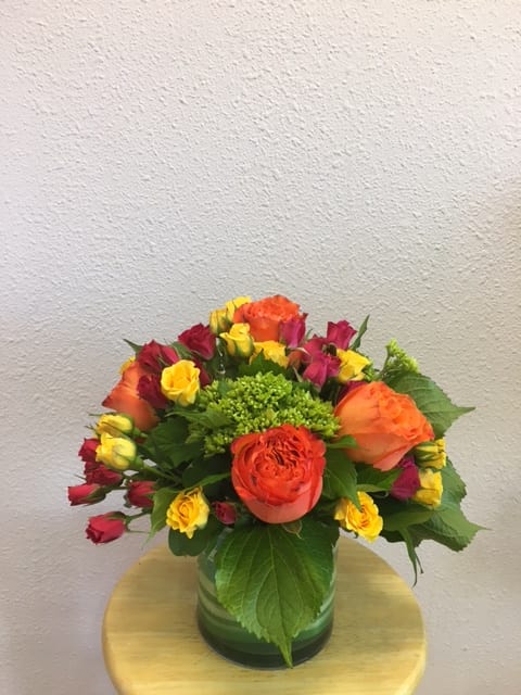 Short and Sweet - Roses, spray roses, and green hydrangea.