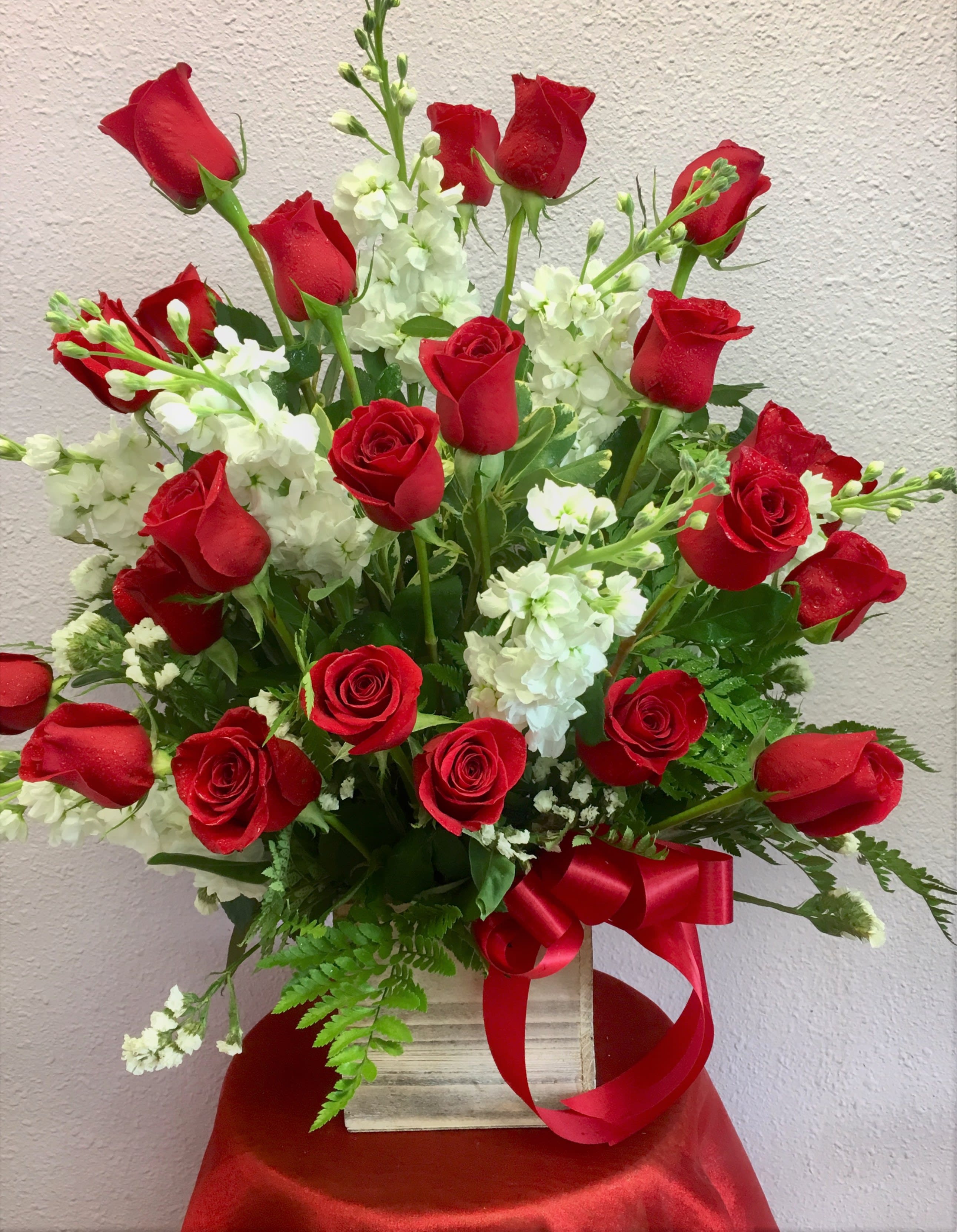 Our Beloved by Forever Flowers - 2 dozen red rose and stock arrangement for funerals &amp; other occasions!