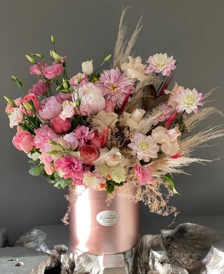 Pink and cream mixed bouquet in a rose-gold box vase