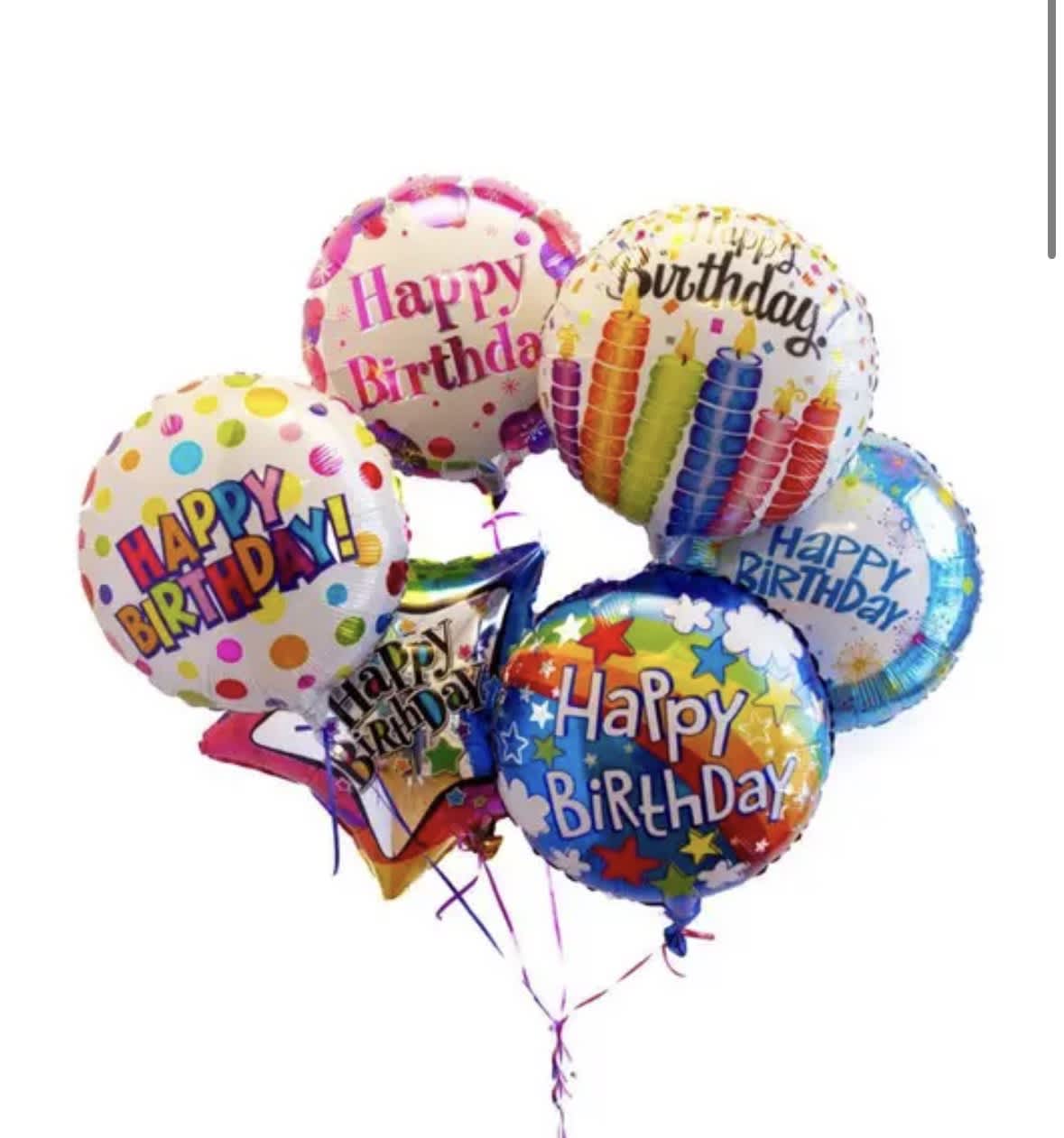 Cluster of colorful birthday balloons with printed messages