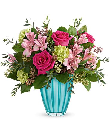 Pink roses and alstroemeria in a turquoise vase