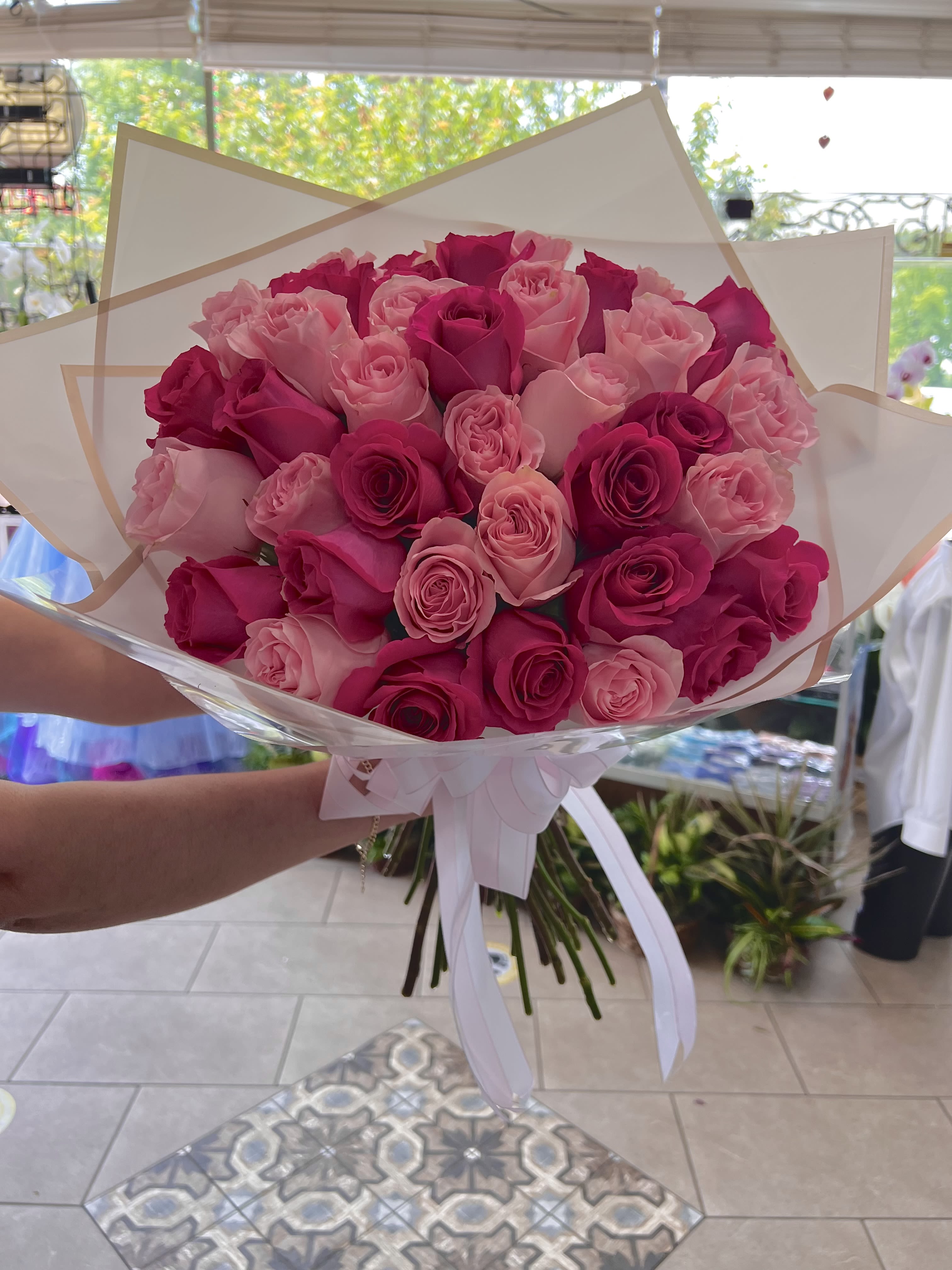 50 Pink Rose Bouquet  - A perfect mixture of light pink and hot pink roses. For a color paper preference please leave a note in the special instructions. If you want a banner please leave it in the special instructions!