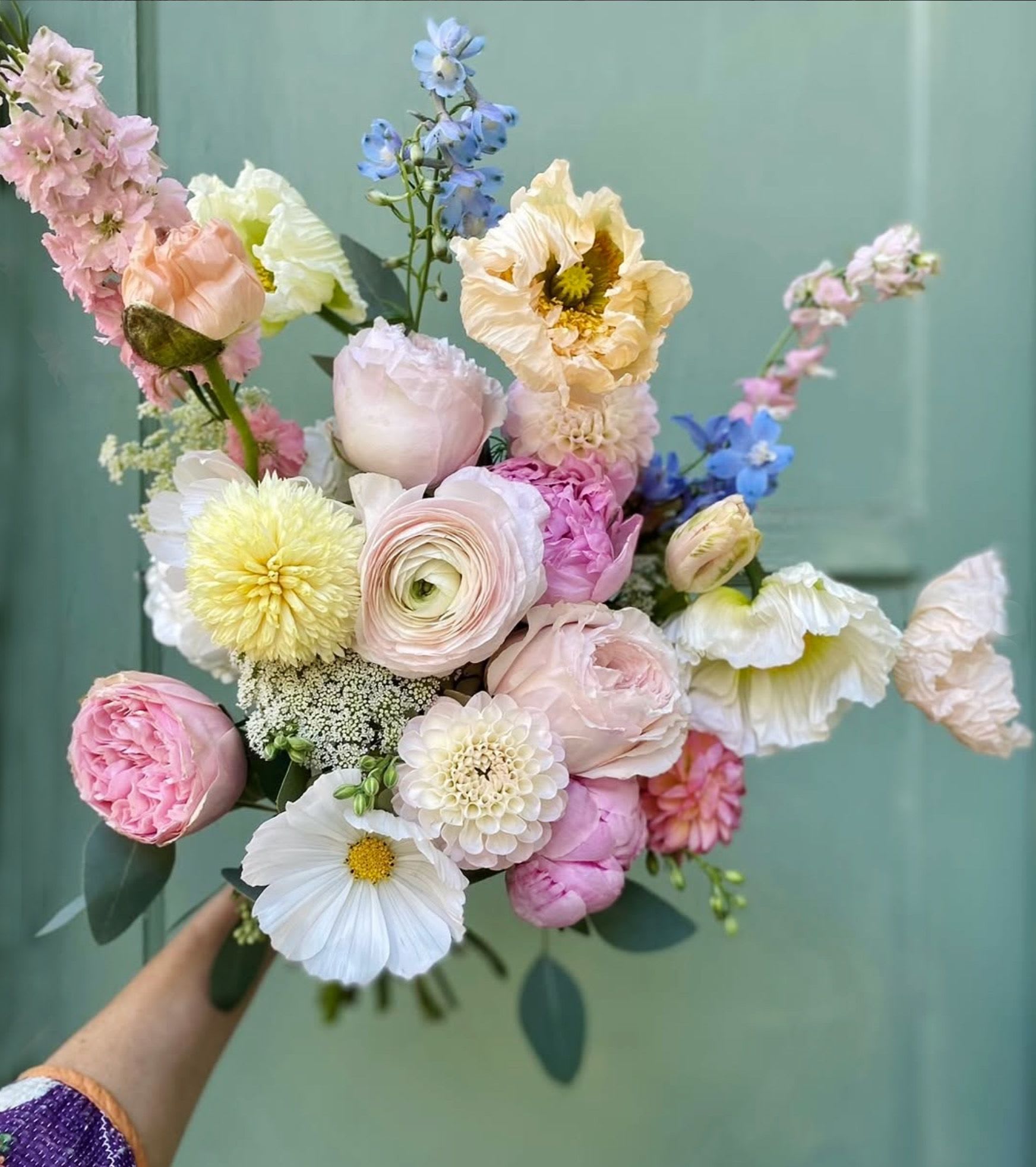 Margot bouquet - Ethereal, poetic hand tied bouquet of dreams. As light as clouds and meadows. Made of fresh, garden like stems in all the pastel colors. Poppies, Delphinium, sweet peas and/or other seasonal stems of the finest quality and colors.