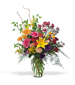Colorful mixed bouquet in a clear glass vase