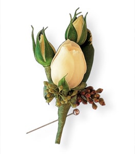 Boutonniere with cream rosebuds and green accents