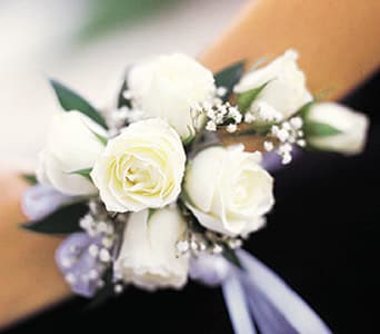 White rose wrist corsage with lavender ribbon