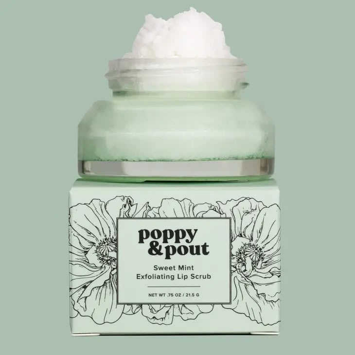 Jar of sweet mint lip scrub on a floral-patterned box