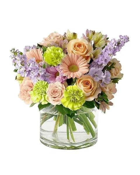 Mixed pastel bouquet in a clear glass vase