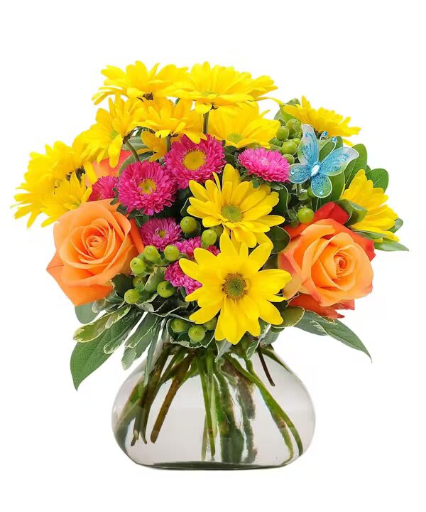 LEMON LIFT - Our Lemon Lift bouquet is guaranteed to elevate the mood and brighten a space. A delightful butterfly accent flutters above a bright, cheery blend of fresh-cut daisy poms, free-spirit roses, asters, and berries.   