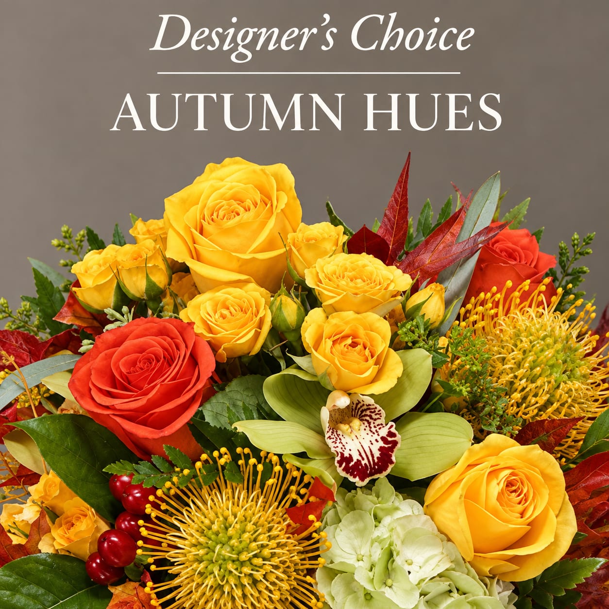 Autumn bouquet with yellow and red roses, orchids, and textured blooms