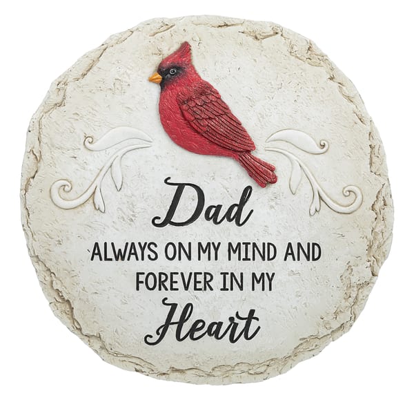 Round memorial plaque with a red cardinal and the word Dad