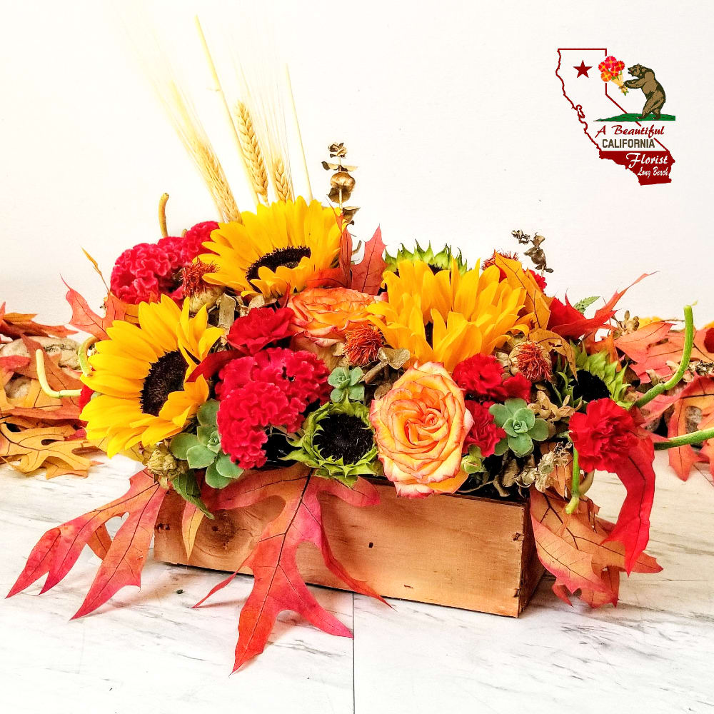 Box of Autumn  - Wouldn’t life be more convenient if seasons came in boxes? We already have boxed wine, boxed lunches, and boxing matches. Seasons need to catch up. Now they have. Introducing the Box of Autumn. Whoever you’re sending this to will smile with seasonal joy upon receiving this abundant box of seasonal blooms. 