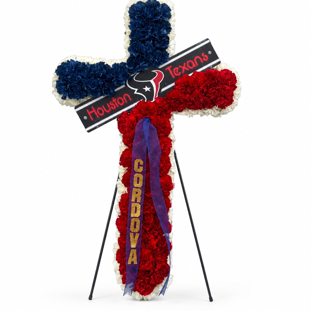 Red, white, and blue floral cross with a Houston Texans sign and ribbon