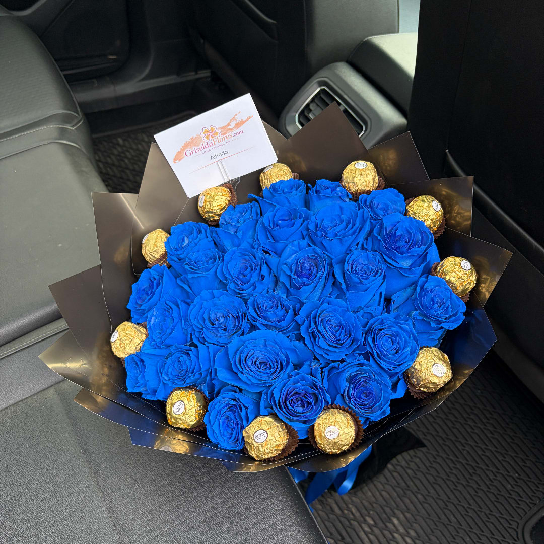 Blue rose bouquet with gold-wrapped chocolates in black paper