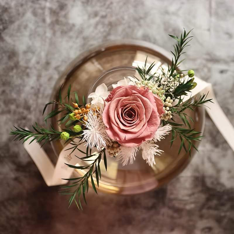 No-Fuss Corsage - Complete your wedding or special event look with our No Fuss Corsage, available in both pin-on and wrist styles. Featuring a beautiful selection of fresh, dried, or artificial blooms and foliage, this corsage can be customized to match your color scheme and floral preferences. The pin-on corsage offers a classic, elegant touch, perfect for formal attire, while the wrist corsage provides a comfortable, stylish alternative with a delicate band for easy wear. Whether for the mother of the bride, bridesmaids, or honored guests, our No Fuss Corsage adds a charming, effortless accent to your special day.