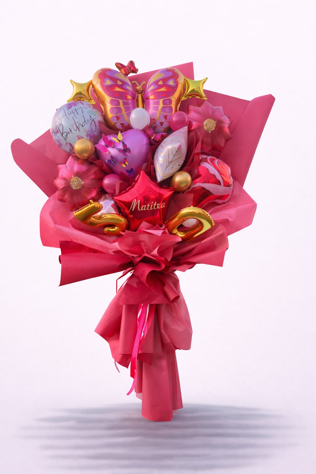 Pink balloon bouquet with butterfly and birthday balloons