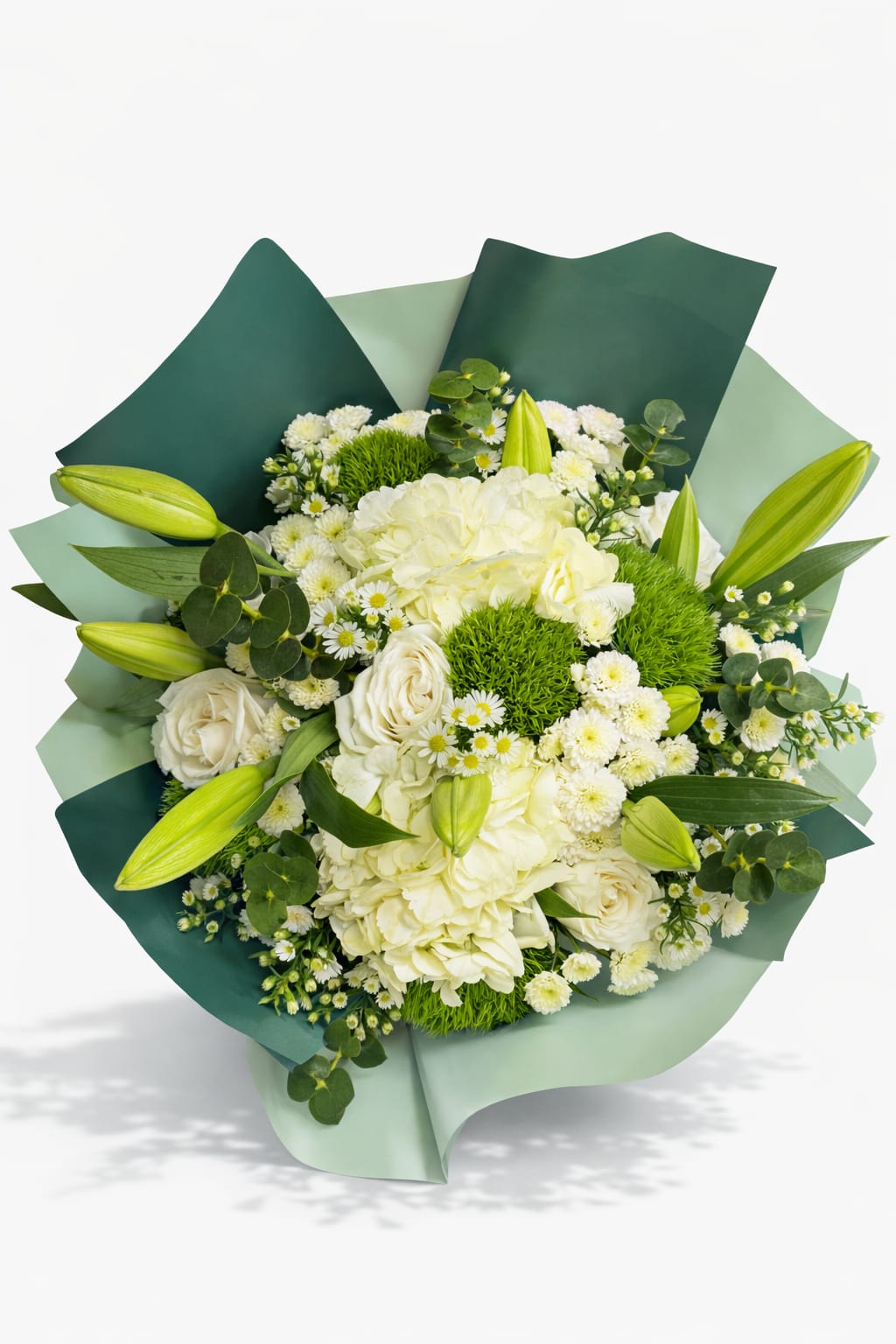 Emerald Garden Bouquet - White and Green Hand-Tied Arrangement - Creamy white hydrangeas, white roses, and petite daisies cluster into a soft, rounded hand-tied bouquet that feels like a quiet breath of fresh air - an elegant birthday bouquet or thinking-of-you gift that will make her feel seen and soothed. Pale green lily buds reach just above the dome, adding a gentle sense of anticipation that's perfect for get well wishes, prom corsages that favor understated charm, or a retirement surprise that honors a career with calm sophistication.  This white and green arrangement pairs bright green cushion chrysanthemums with touches of eucalyptus and small white filler blooms, all wrapped in layered two-tone green paper and finished with a green satin ribbon bow and trailing white ribbon strands. The bouquet's modern, clean silhouette measures as a hand-tied arrangement ideal for vase display; its textures range from the hydrangeas' cloudlike fullness to the lilies' poised buds and the daisies' cheerful centers. Also seen in photos: subtle yellow chrysanthemums that accent the composition.  Send this bouquet to mark an anniversary without fanfare, say thank you with quiet elegance, or lift spirits on Mother's Day, Father's Day, Best Friends Day, or Women's Day - it's the kind of gift that helps someone feel genuinely cared for. Available for delivery in Newington, CT; order with care instructions included so the recipient can enjoy the blooms longer.