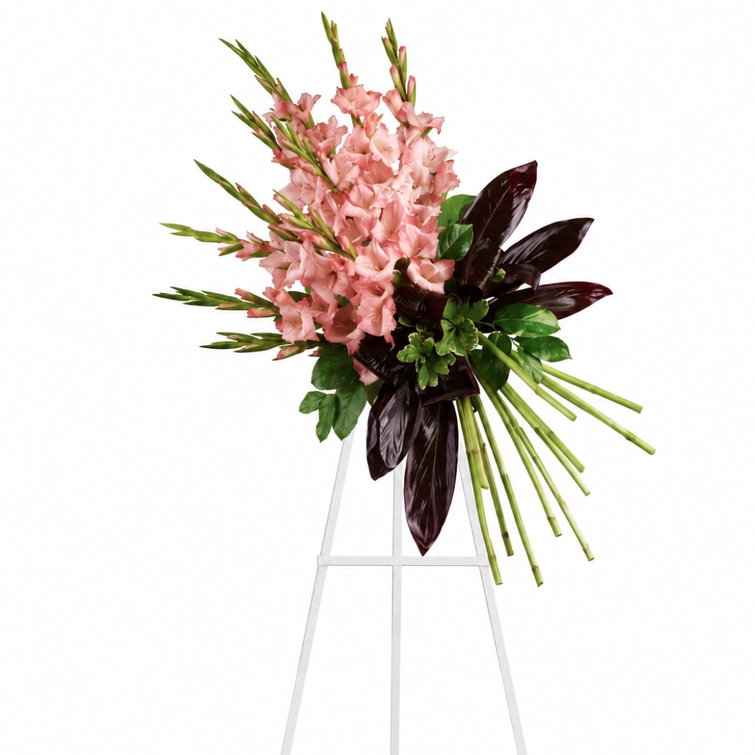 Pink gladiolus arrangement with dark leaves on a white stand