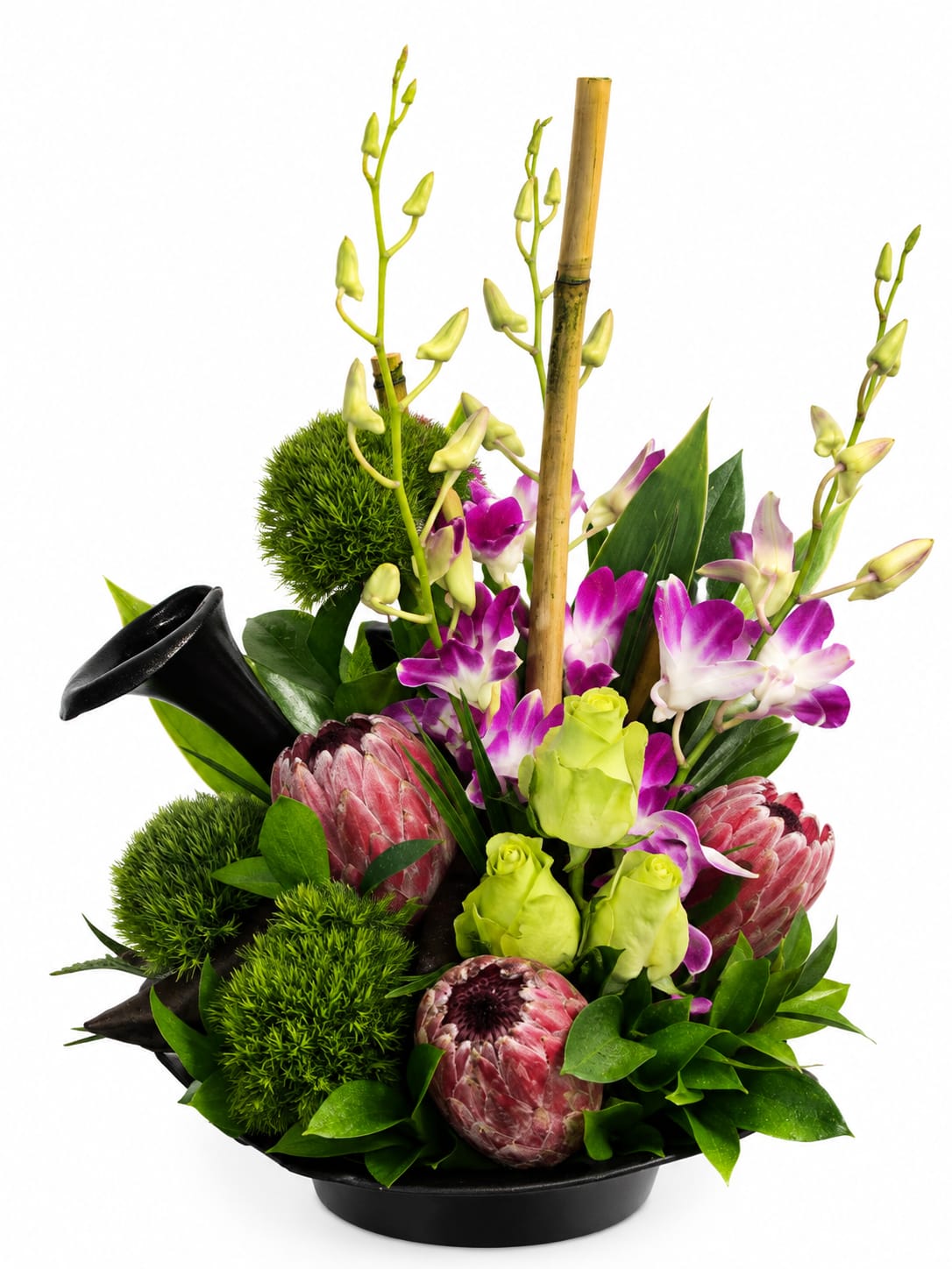 Tropical bouquet with purple orchids and pink protea in a black vase