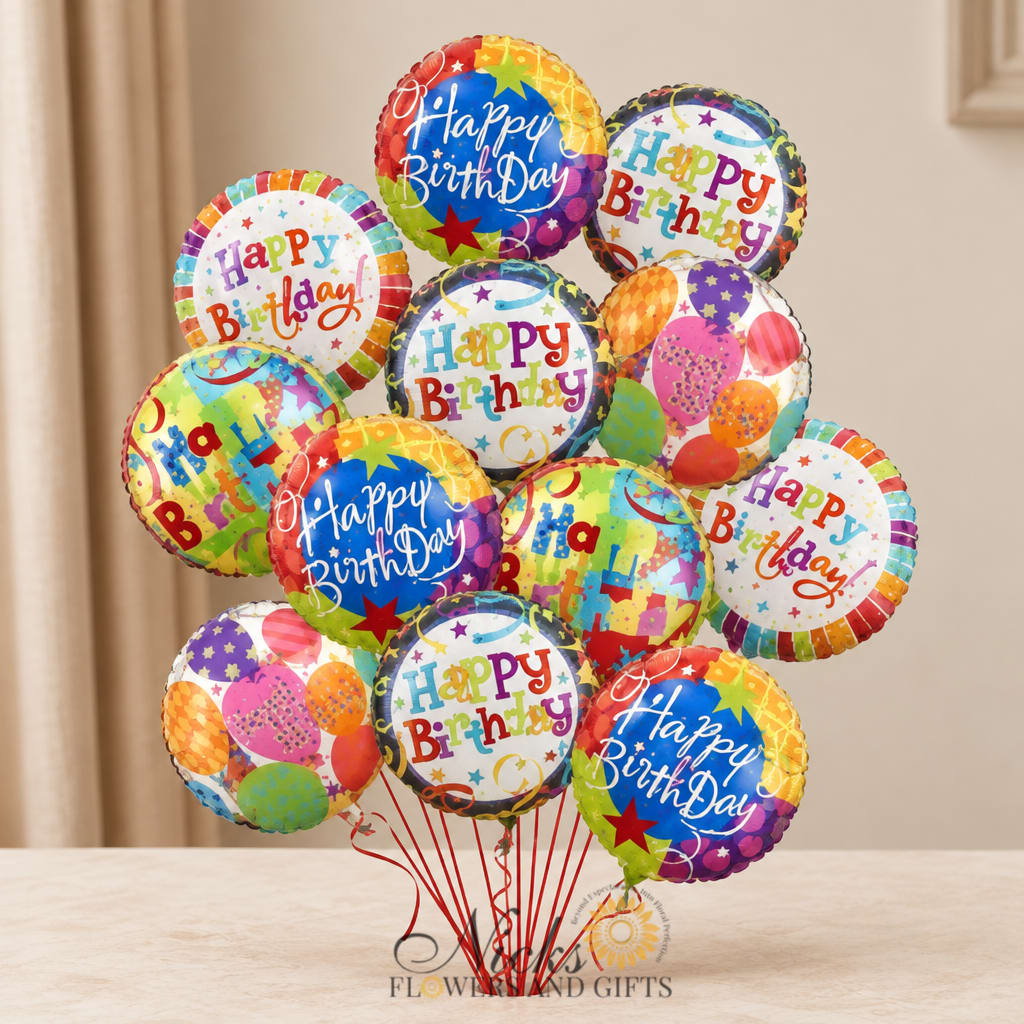 Cluster of colorful Happy Birthday balloons on thin sticks