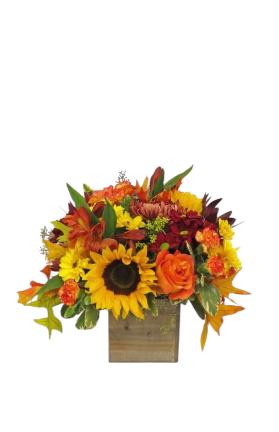Welcome  Autumn - Autumn season arrangement including Chrysanthemums, orange mini carnations, sunflowers, orange roses, alstroemeria and safari with autumn leaves in a wood box.
