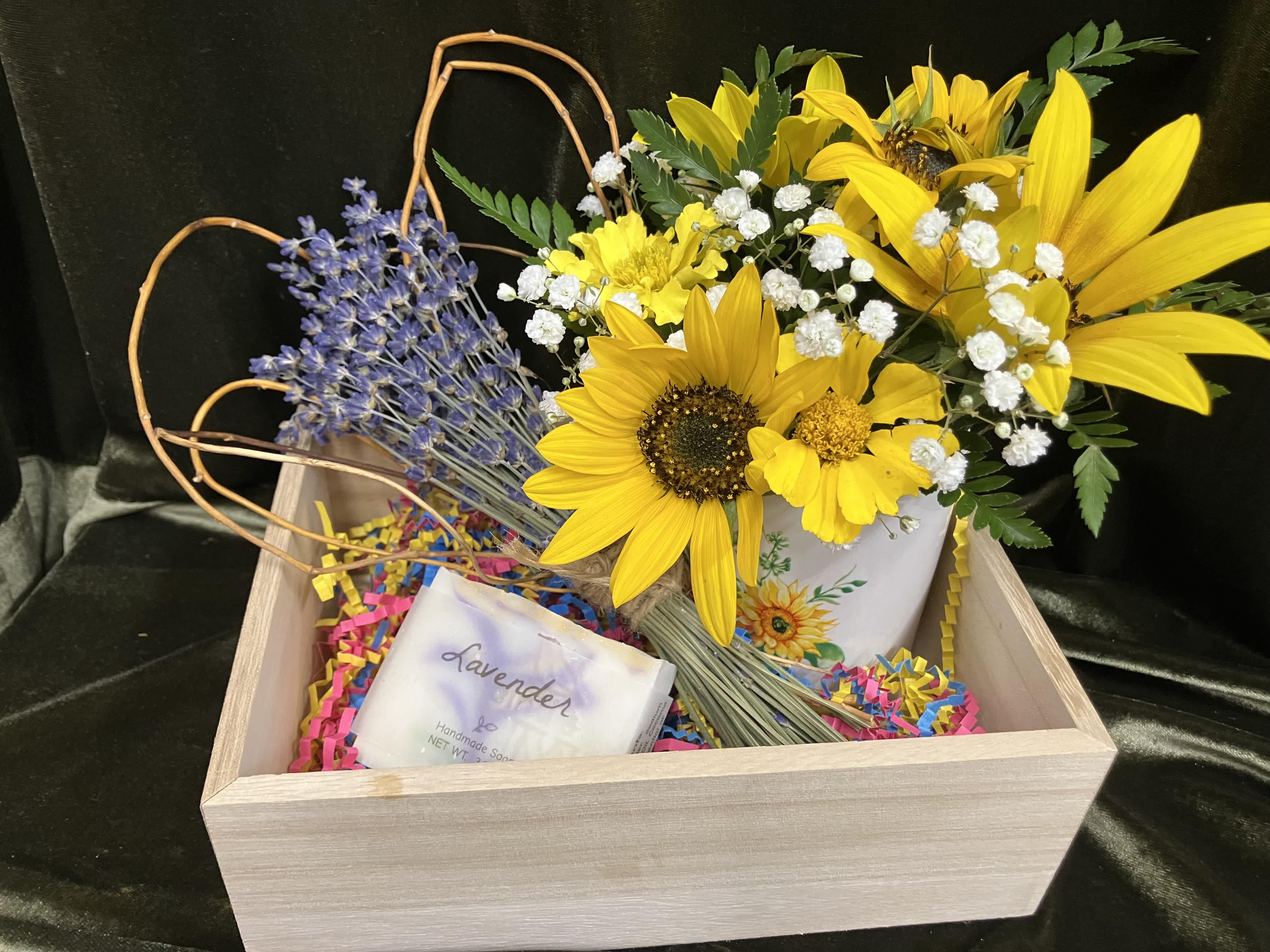 Sunflower arrangement in a wooden gift box with a lavender soap bar