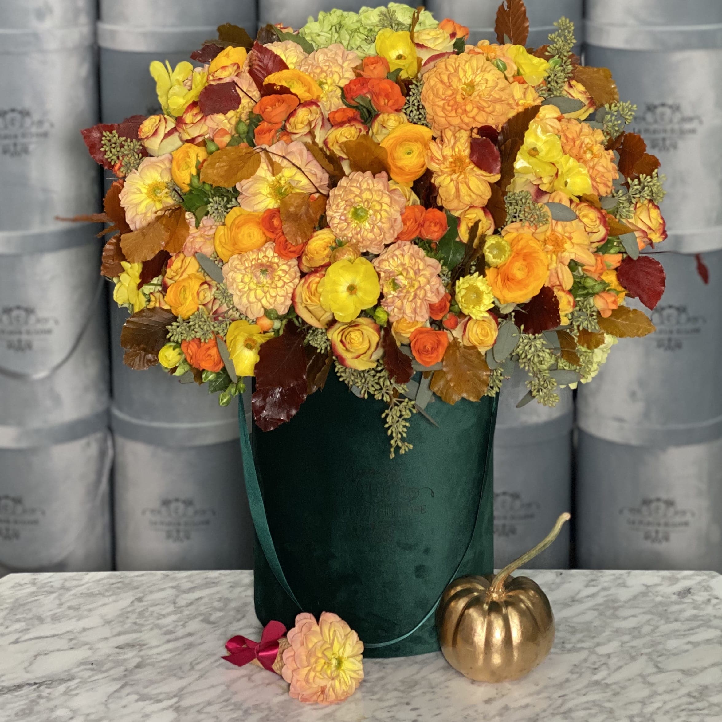 Thanksgiving - Wonderful arrangement in our dark green velvet signature box filled with roses, dahlias, spray roses, hydrangeas and some decorative leaves and greenery. 